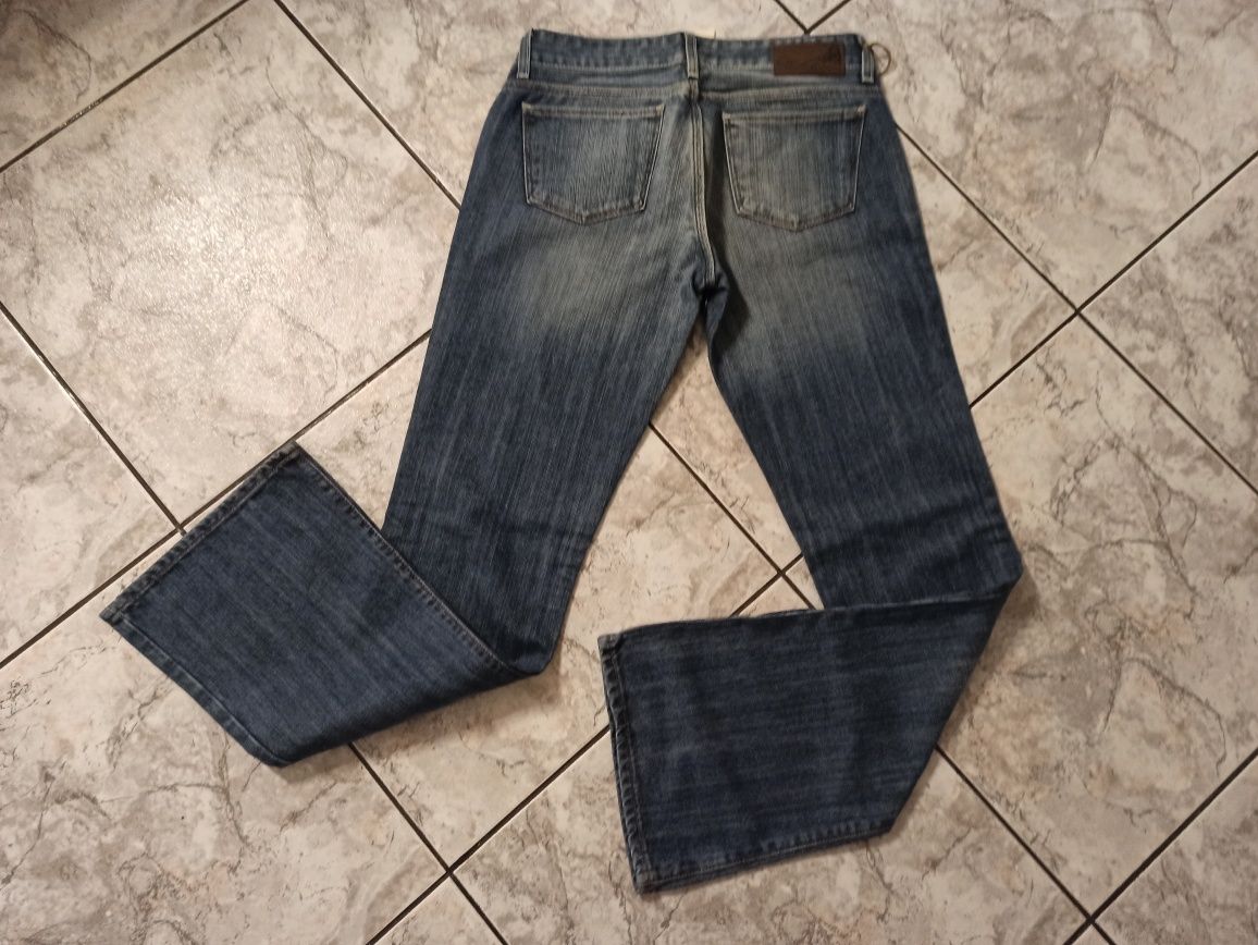 Biodrówki damskie dzwony niski stan 90s vintage Cross jeans.
Rozmiar: