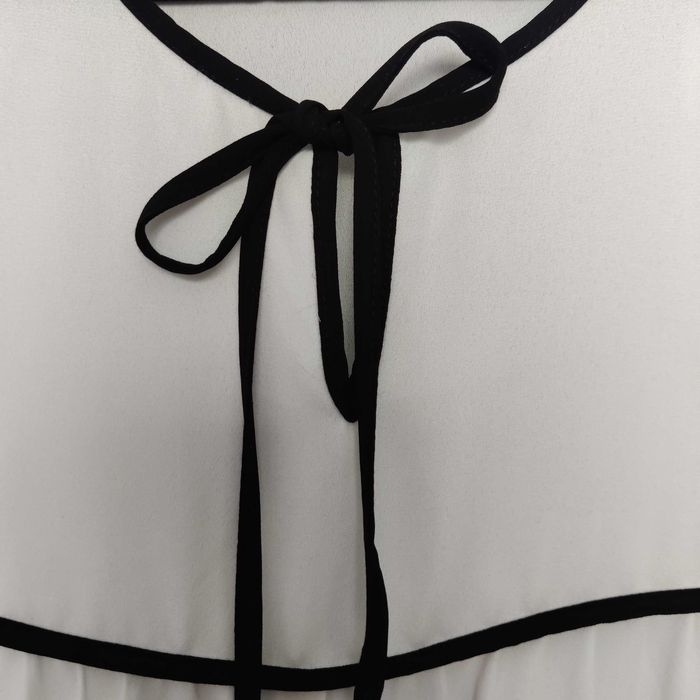 Biała bluzka oversize z czarną lamówką- Orsay - S / 36