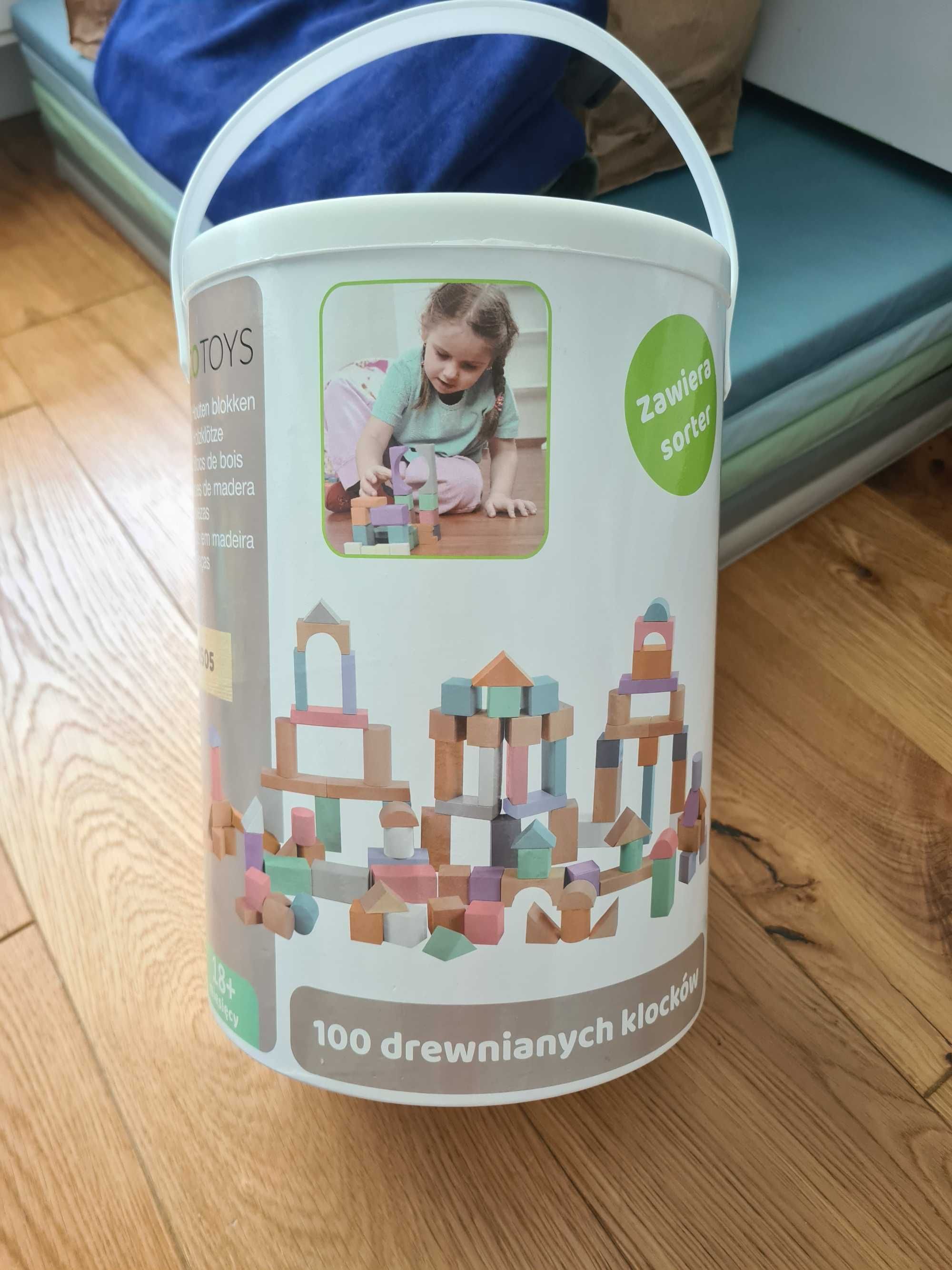 Ecotoys 100 drewnianych klocków z sorterem pastelowe