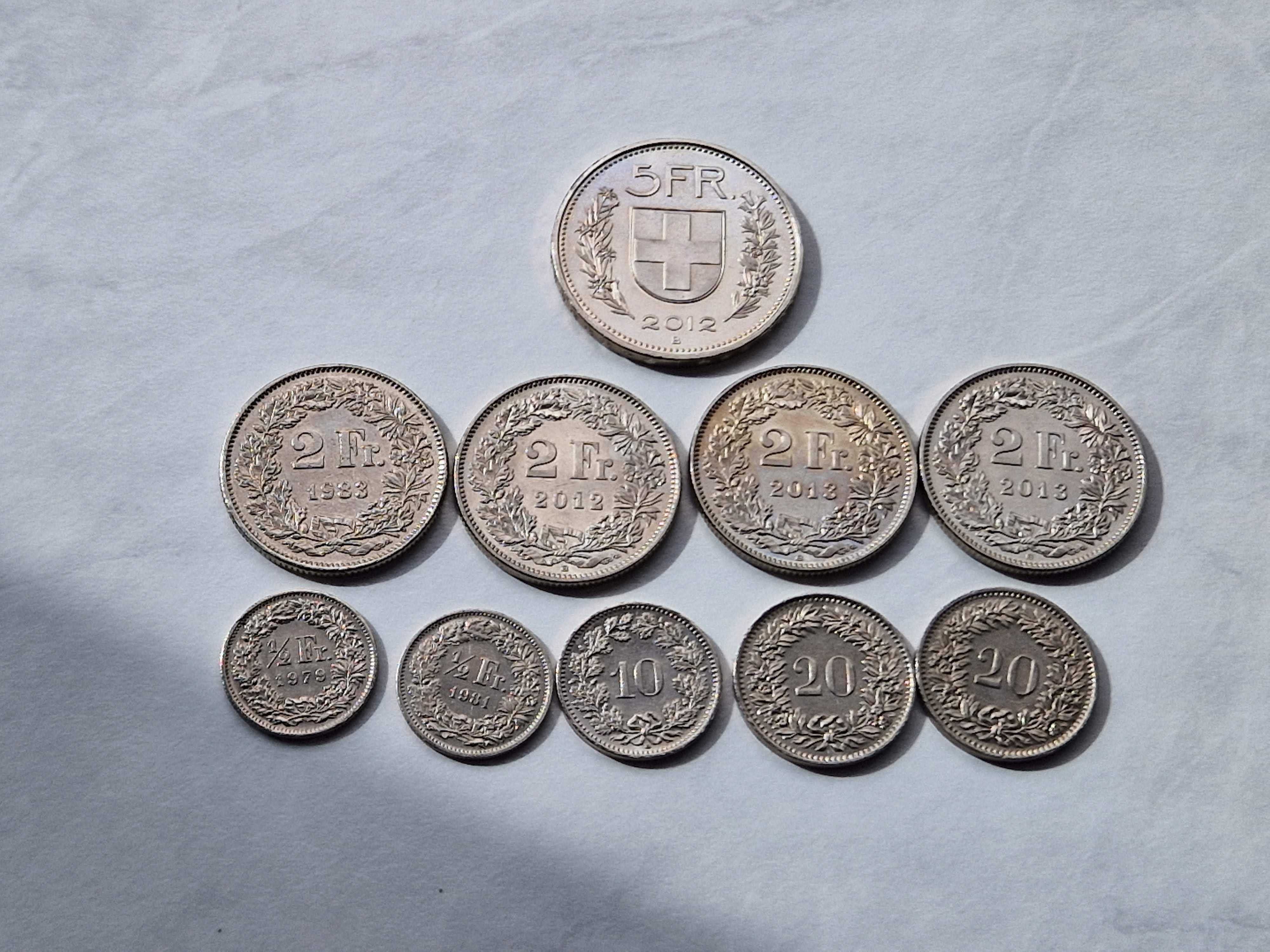 10 монет Швейцарії (5 франків, 2 франки, 1/2 франка, 10 і 20 сантимів)