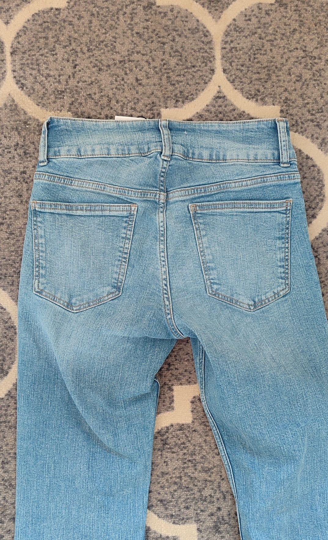 Nowe jeansy flare szerokie nogawki
