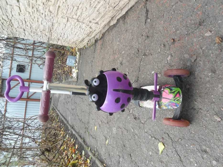 Продам детский з-х колесный самокат фиолетовый и зеленый от 2 - 5 лет