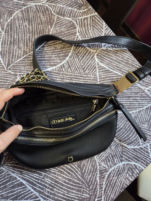 Saszetka nerka skórzana Ochnik damska