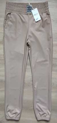 Nowe spodnie legginsy eko skóra beżowe XL/XXL