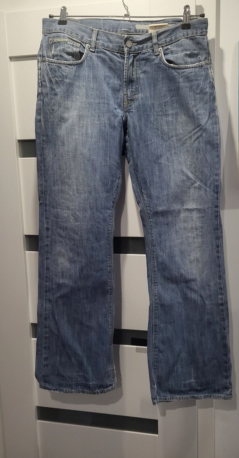Jeansy spodnie niebieskie Calvin Klein CK