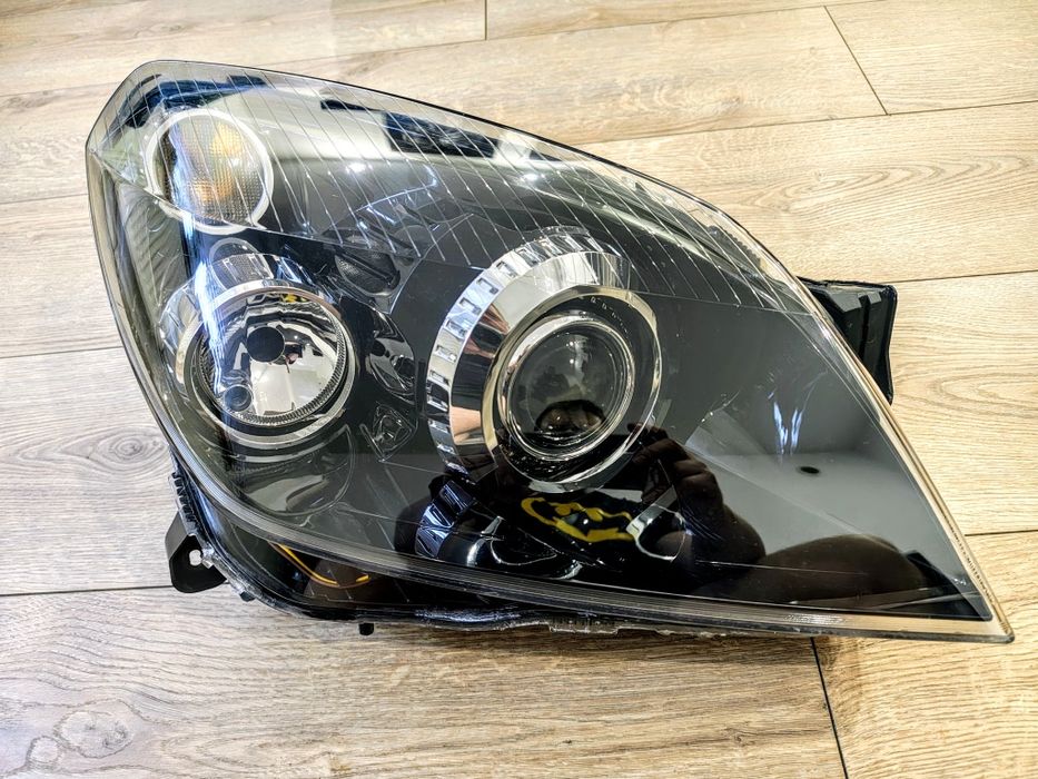 Reflektor lampa przód prawa opel astra h 3 III bixenon skrętny eu
