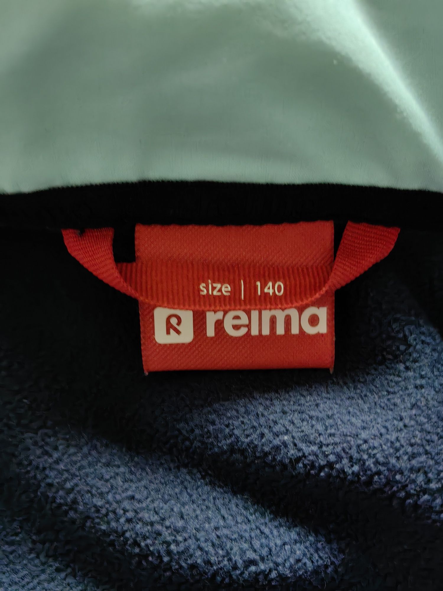 Kurtka softshell REIMA z podpinką polar  rozmiar 140