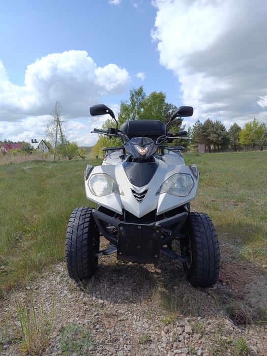 Quad E-Ton 250 z Papierami