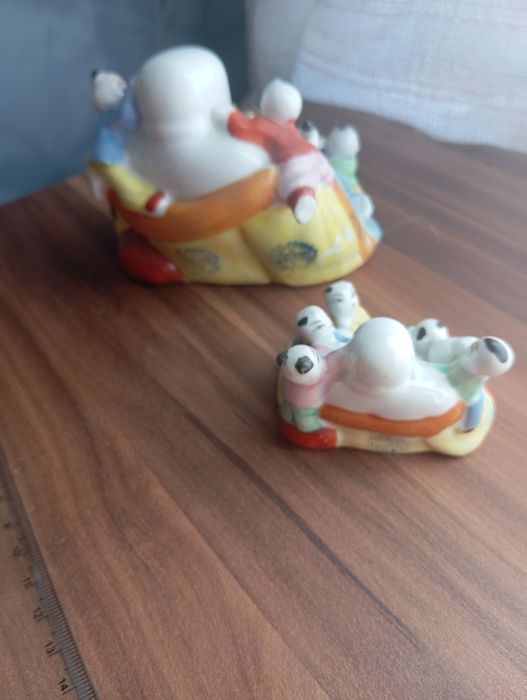 Buda de fertilidade em porcelana