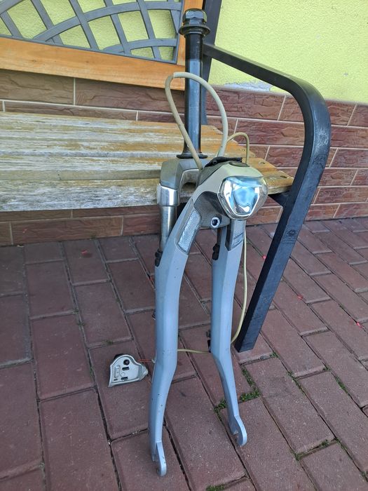 Amortyzator z lampka do roweru elektrycznego Gazelle