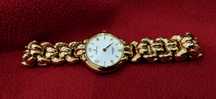 Lindo Relógio Festina banhado a ouro e à prova de água, para senhora!