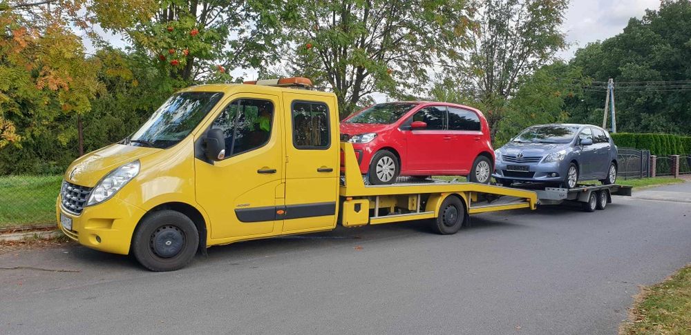Auto laweta Pomoc drogowa 24/7 transport europa holowanie