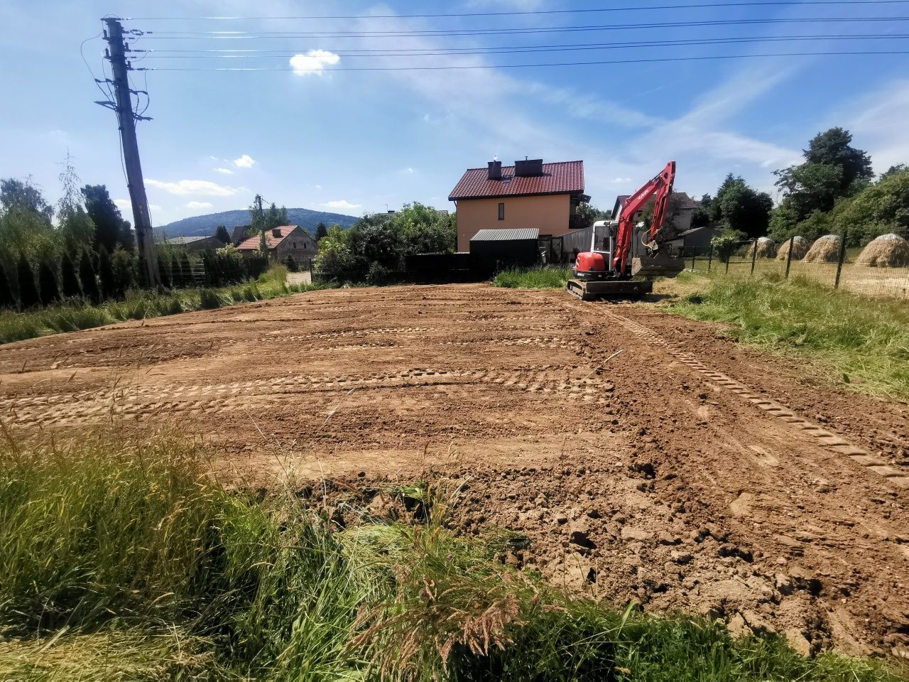 Usługi koparka niwelacja terenu, działki itp