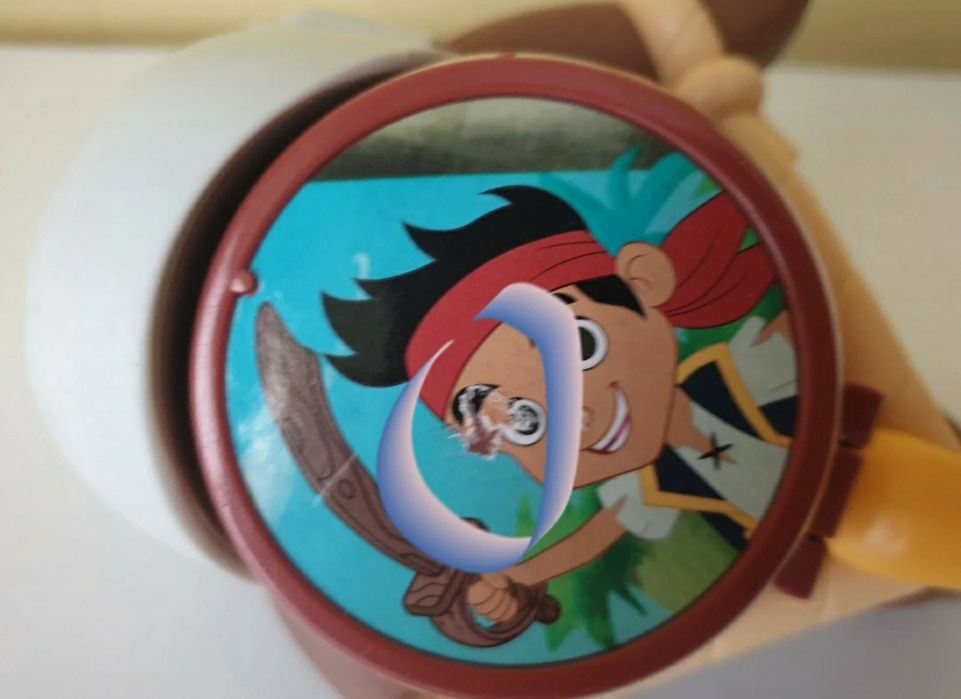 Łuk do strzelania czaszka Piotruś Pan i Nibylandia Mattel  zestaw