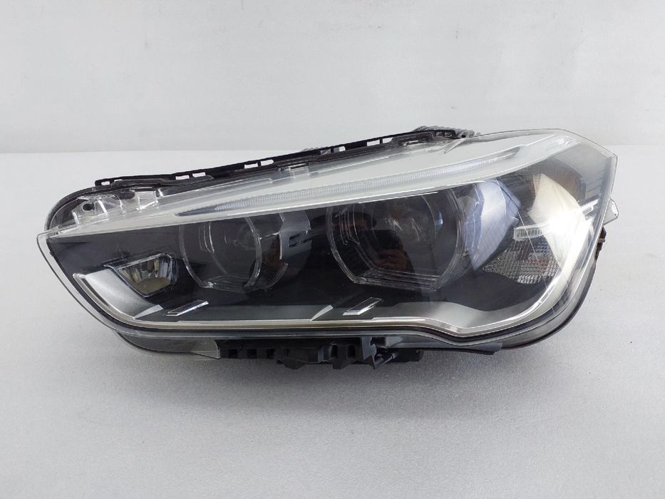 Ótica / farol esquerda BMW X1 (F48)