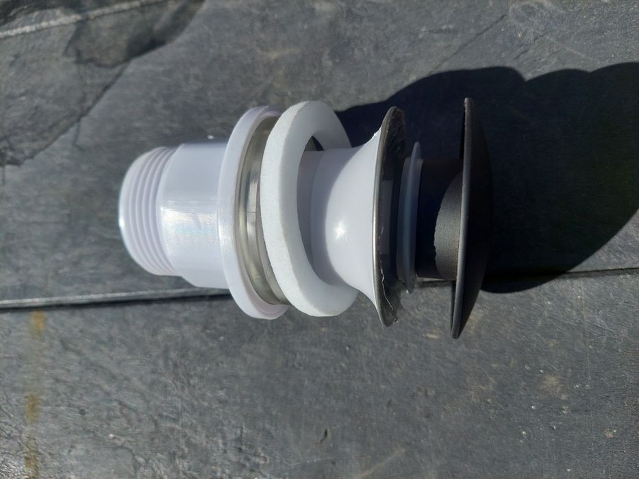 Korek CLICK-CLACK okrągły do umywalki lub bidetu