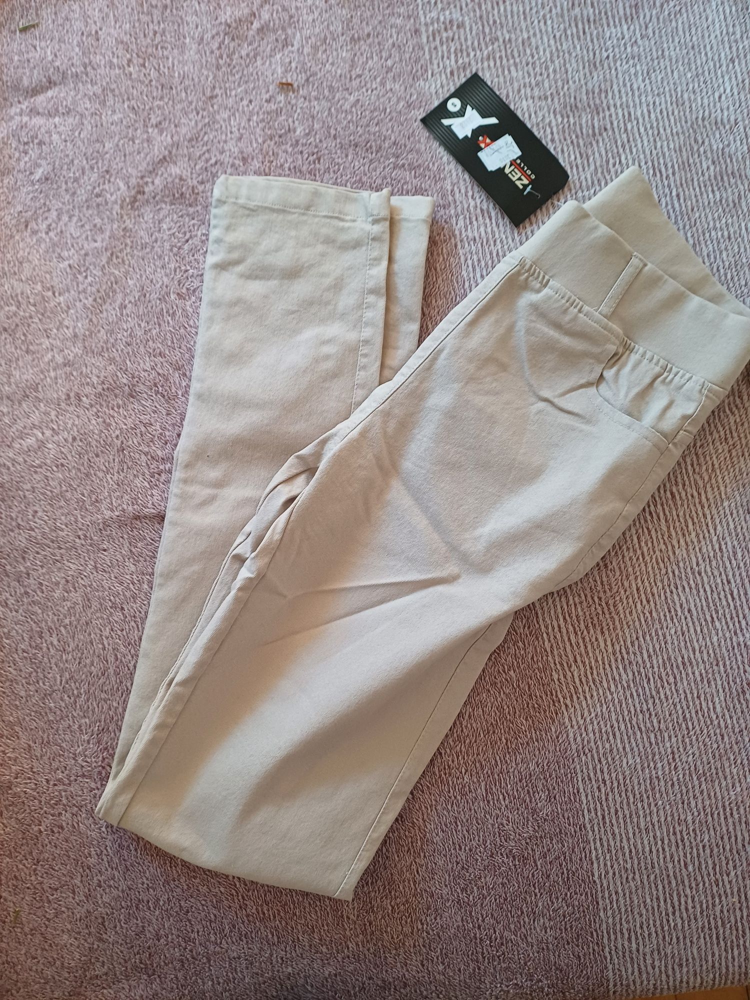 Nowe spodnie metki 36 s bezowe wysoki stan metki jeans stretch