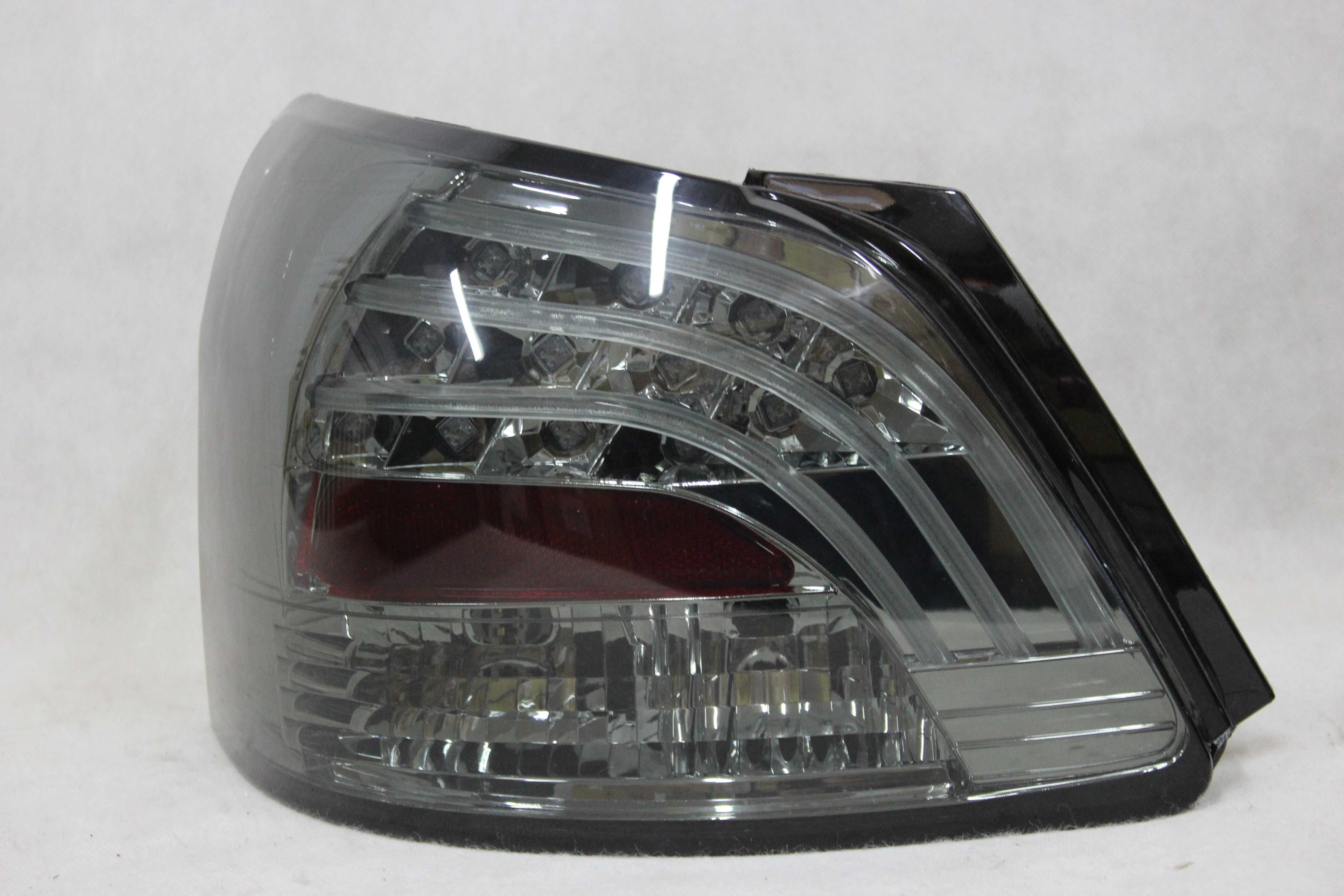 Lampy światła tył tylne TOYOTA Yaris II Vios Belta XP90 08-11 LED NOWE