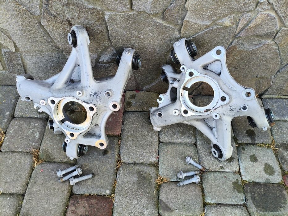 Цапфа поворотний кулак тесла Модел 3 оригінал задній лівий правий