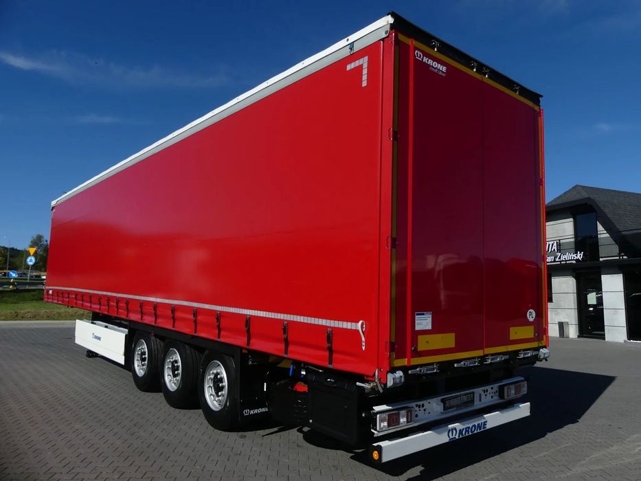 Krone FIRANKA / OŚ PODNOSZONA / IDEALNY STAN / PALECIARA /