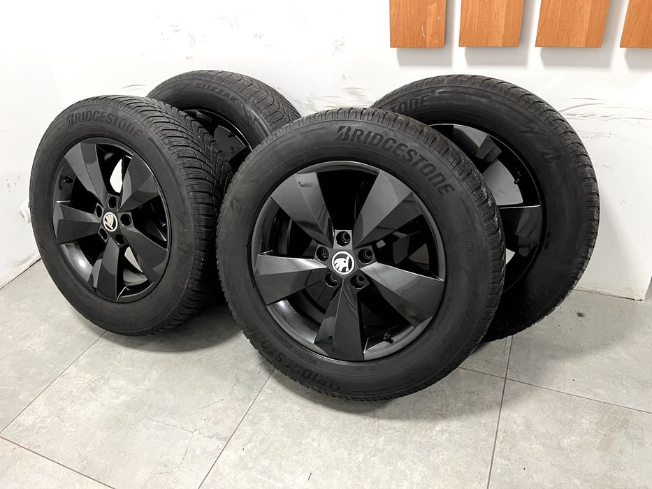 Koła zimowe alufelgi Skoda 17 5x112 ET38 215/65/17 103H Blizzak LM005