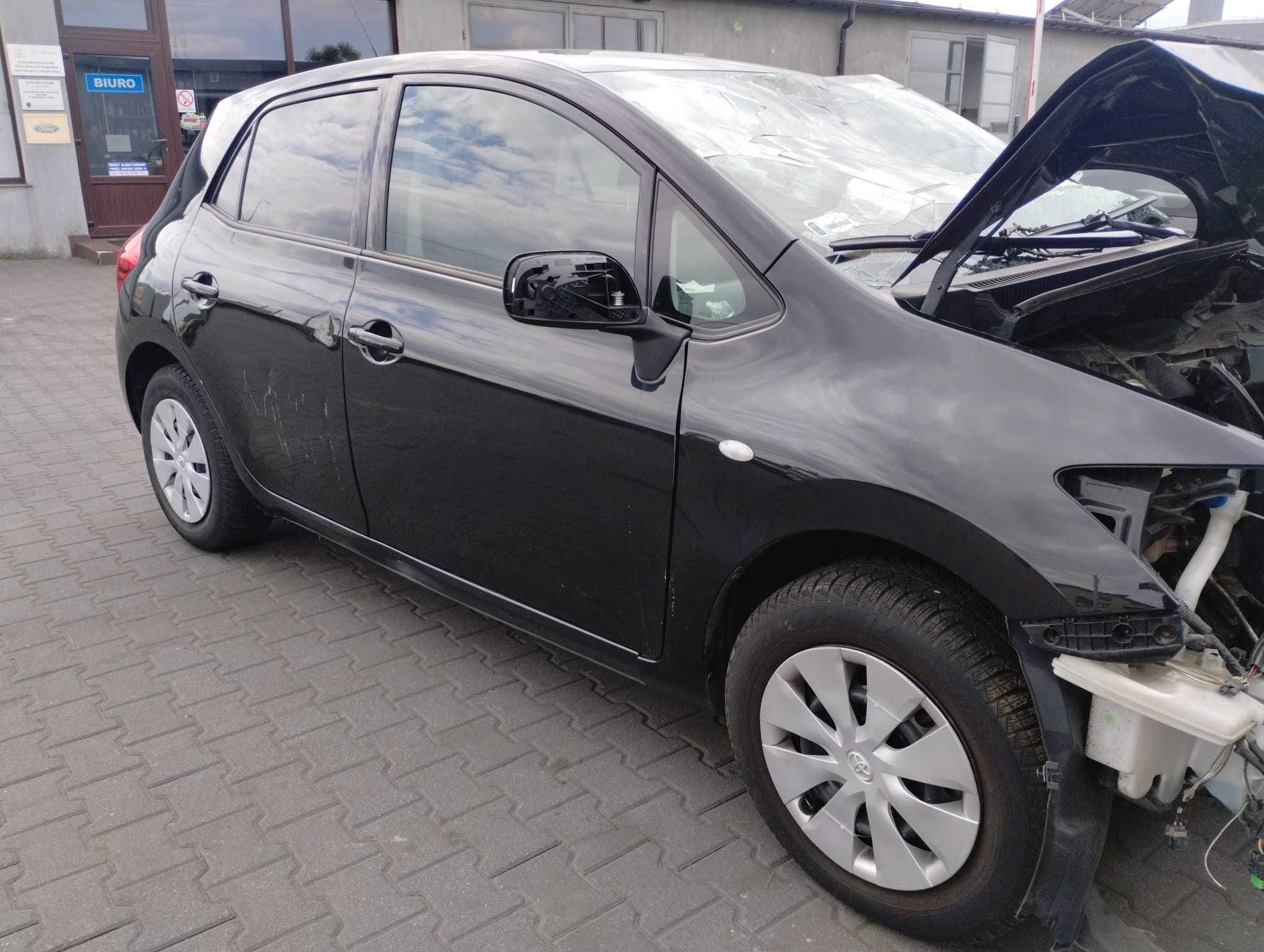 Drzwi przód przednie prawe Toyota Auris I E15 06-09 lakir 206 5d