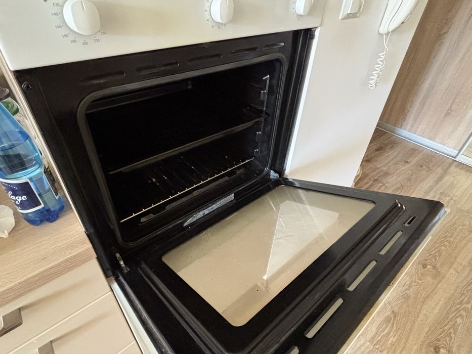 Biały piekarnik gazowy do zabudowy meblowej CANDY