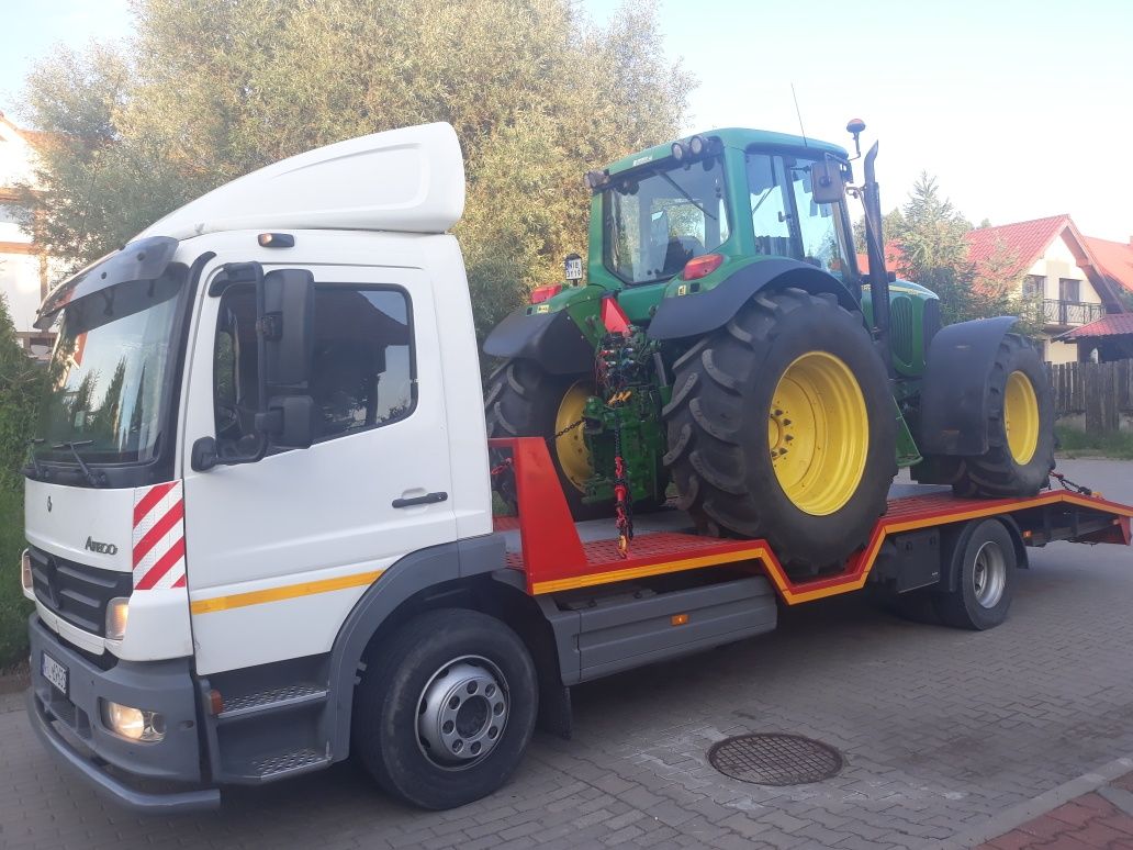 Transport   maszyn rolniczych, budowlanych kombajnów usługi transporto