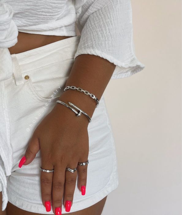 Pulseiras e anéis em aço inoxidável