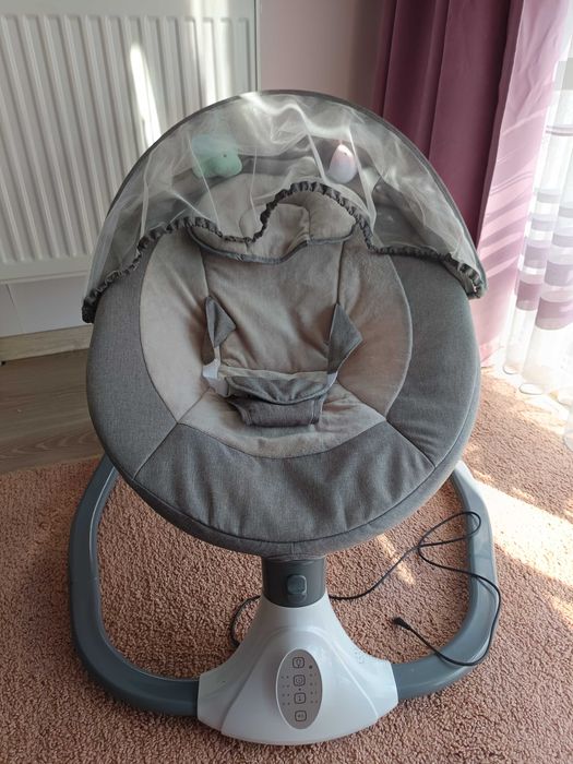 Дитяча електрична гойдалка