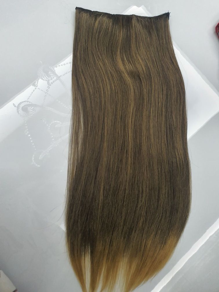 Cabelo humano é castanho peso total é de 235gr