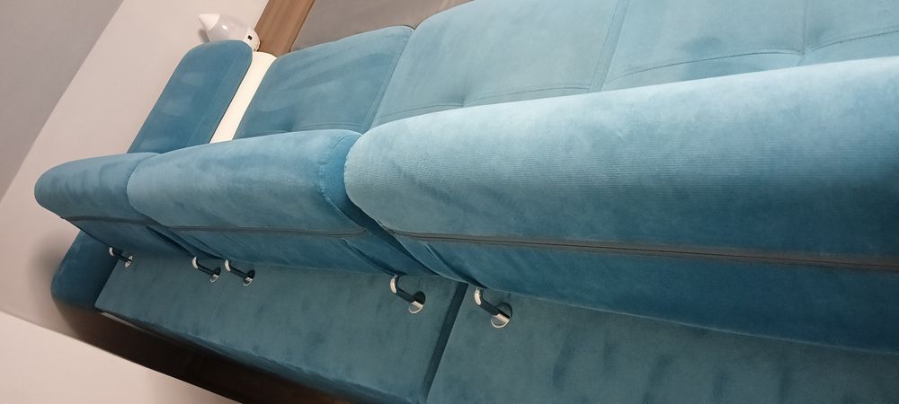 Kanapa rogówka z funkcją spania i pojemnikiem