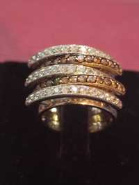 золотое кольцо 585 пробы с фианитами белого и коричневого цвета