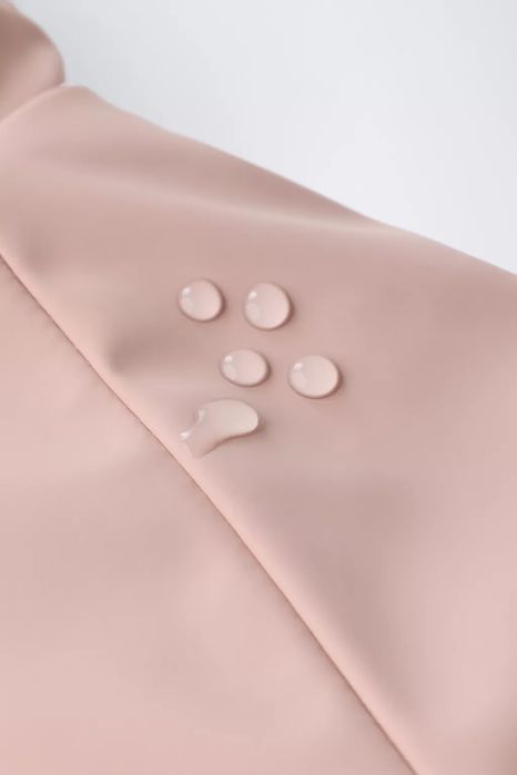 Прогумована водовідштовхувальна куртка з ефектом хутра Zara