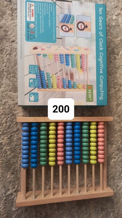 Дерев'яні розвиваючі іграшки, книги для малят