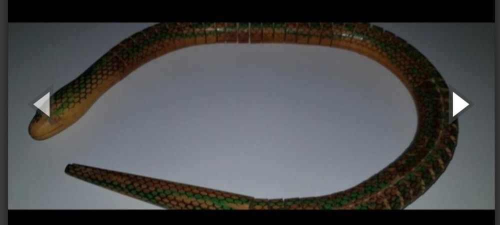 Игрушка змейка из дерева