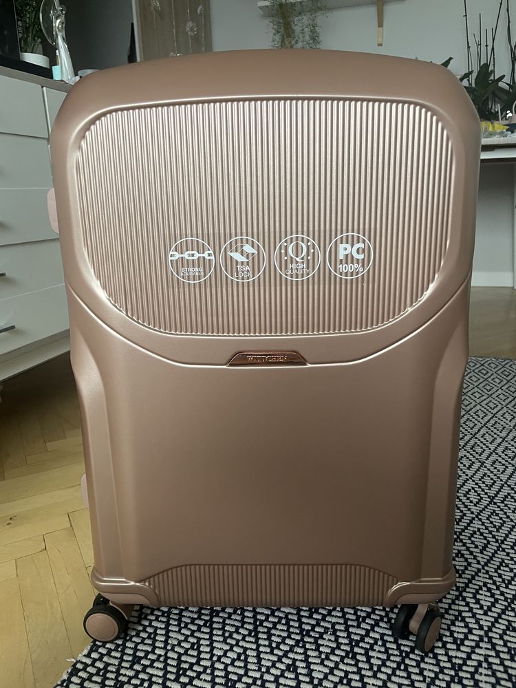 Duża walizka z polikarbonu Wittchen rose gold