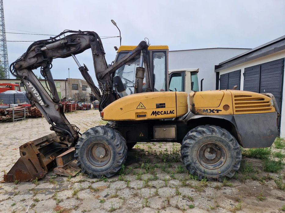 Mecalac 12 MXT  z kompletem łyżek + widły (tylko 4233 mth)
