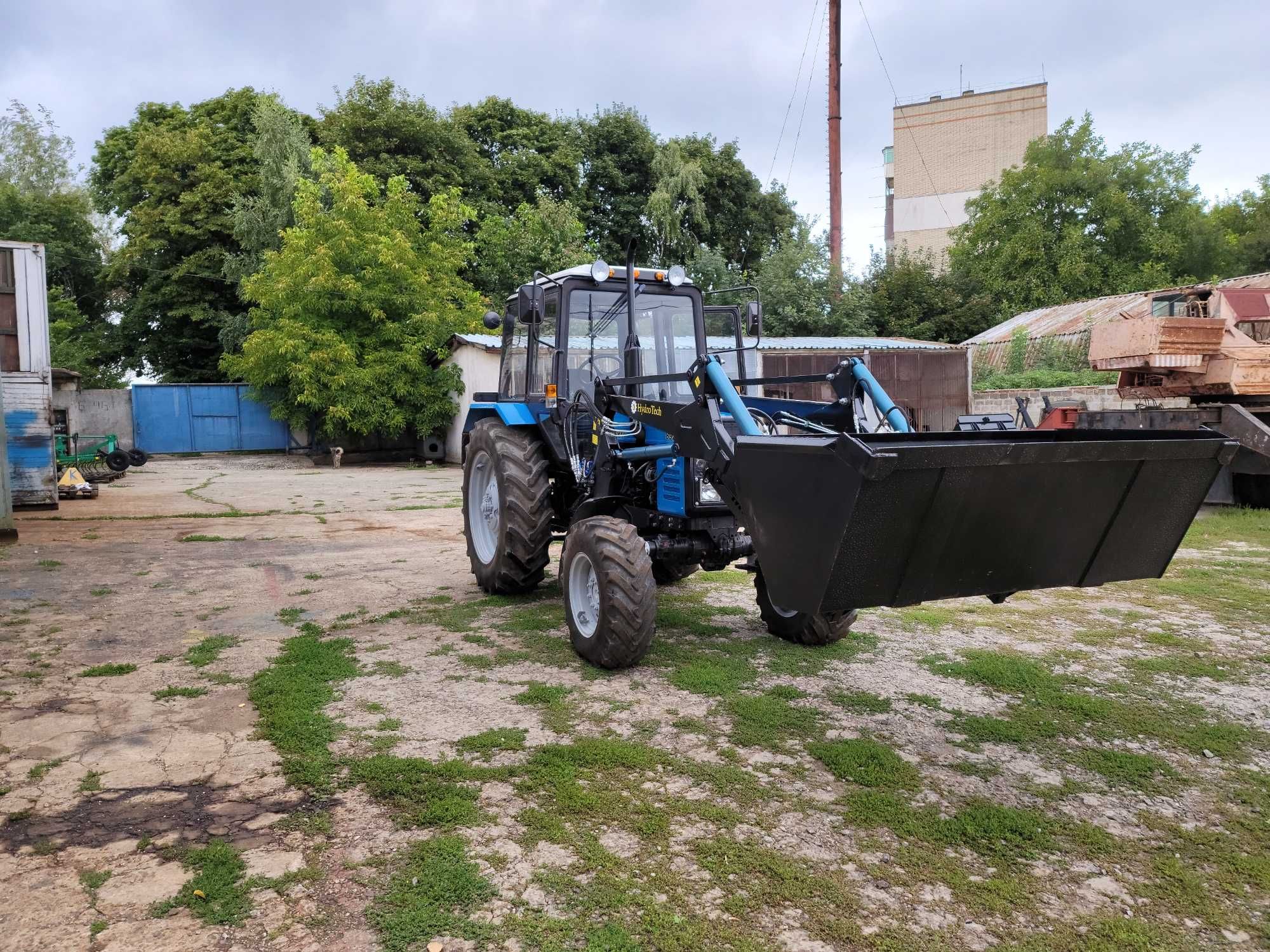 Быстросйомный фронтальный погрузчик кун .