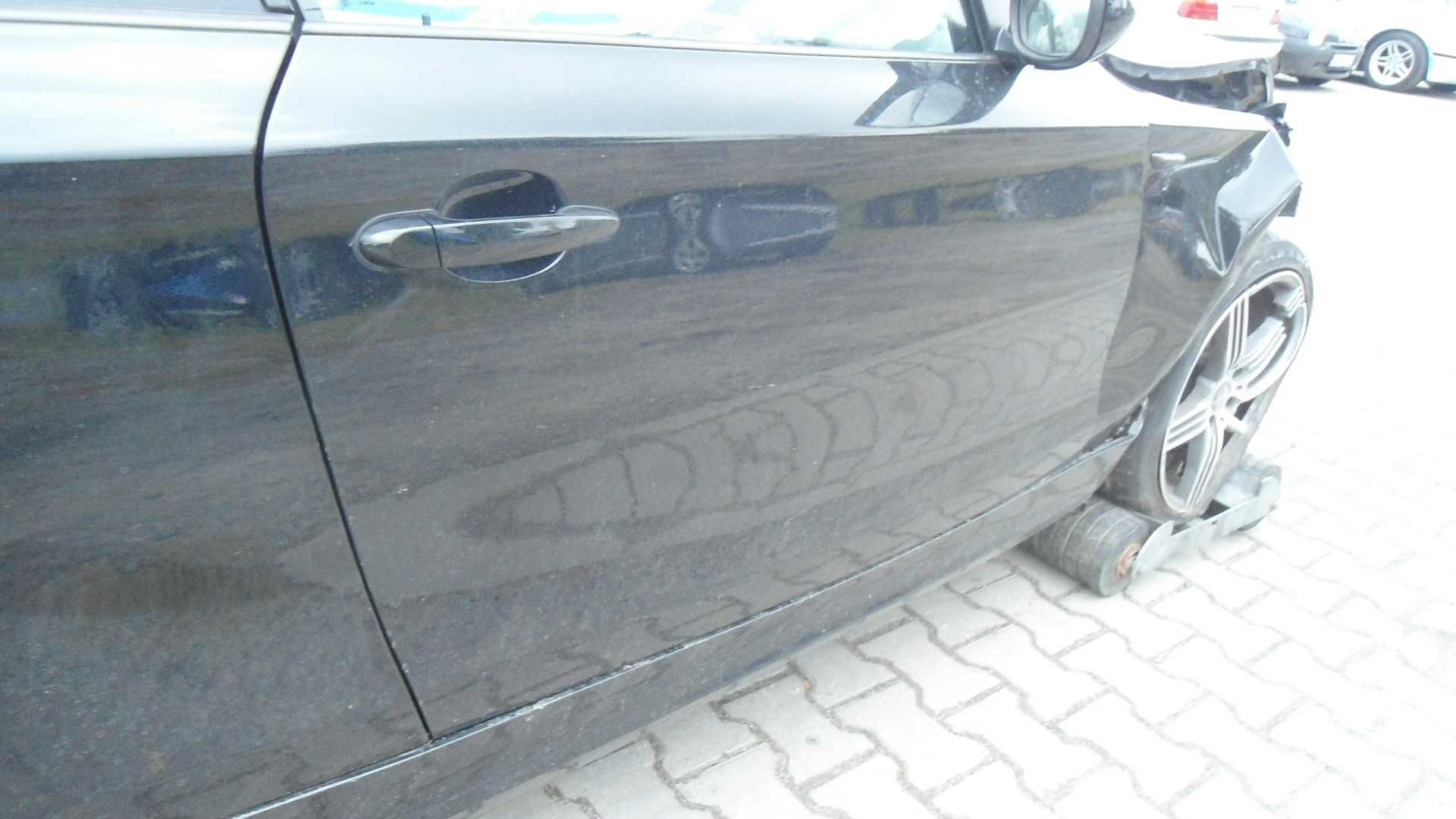 Drzwi Prawe BMW E81 Black Saphire Metalic 2009r