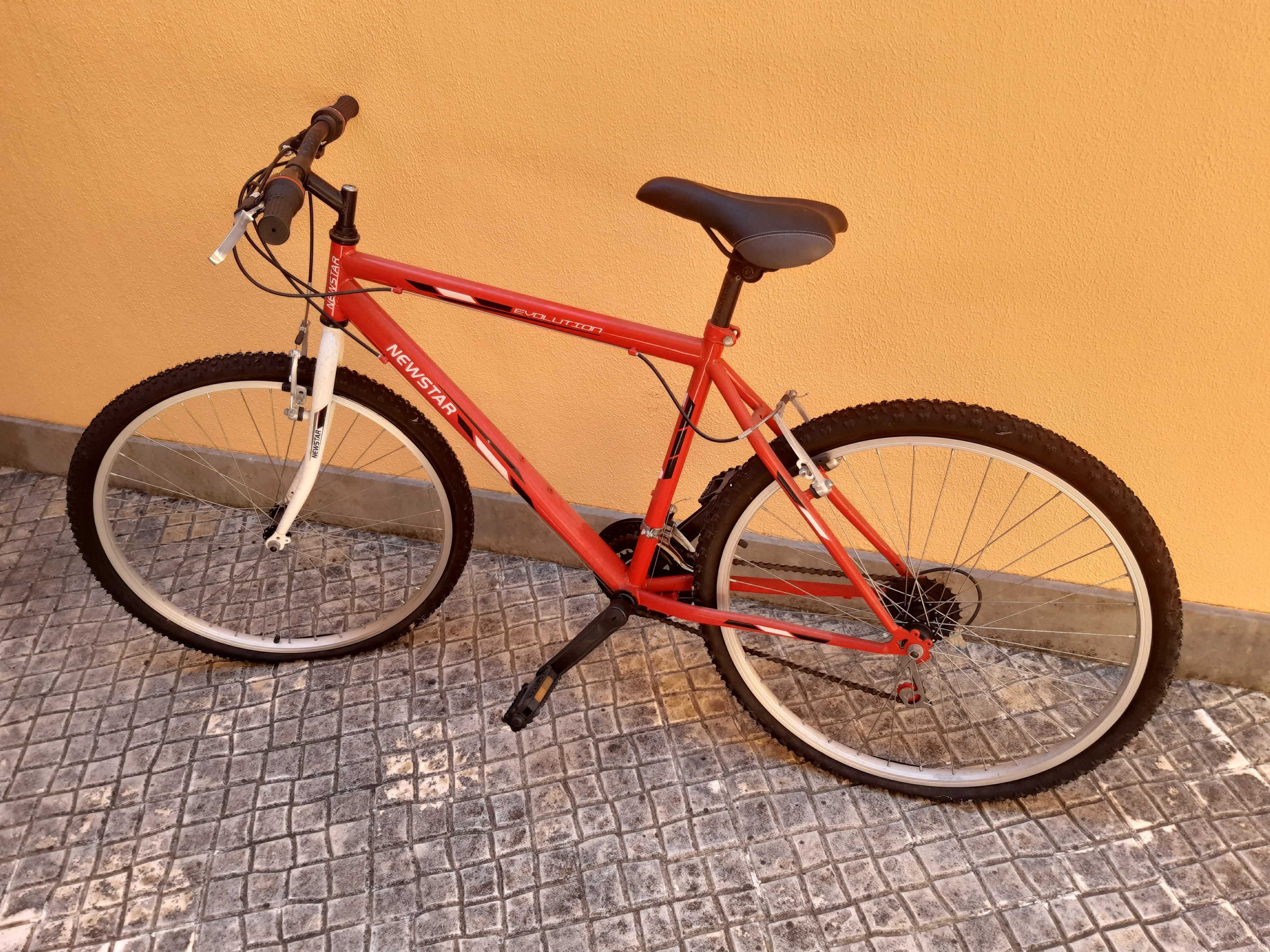 Bicicleta Marca NEWSTAR, Modelo Evolution, 12 Velocidades, bom estado