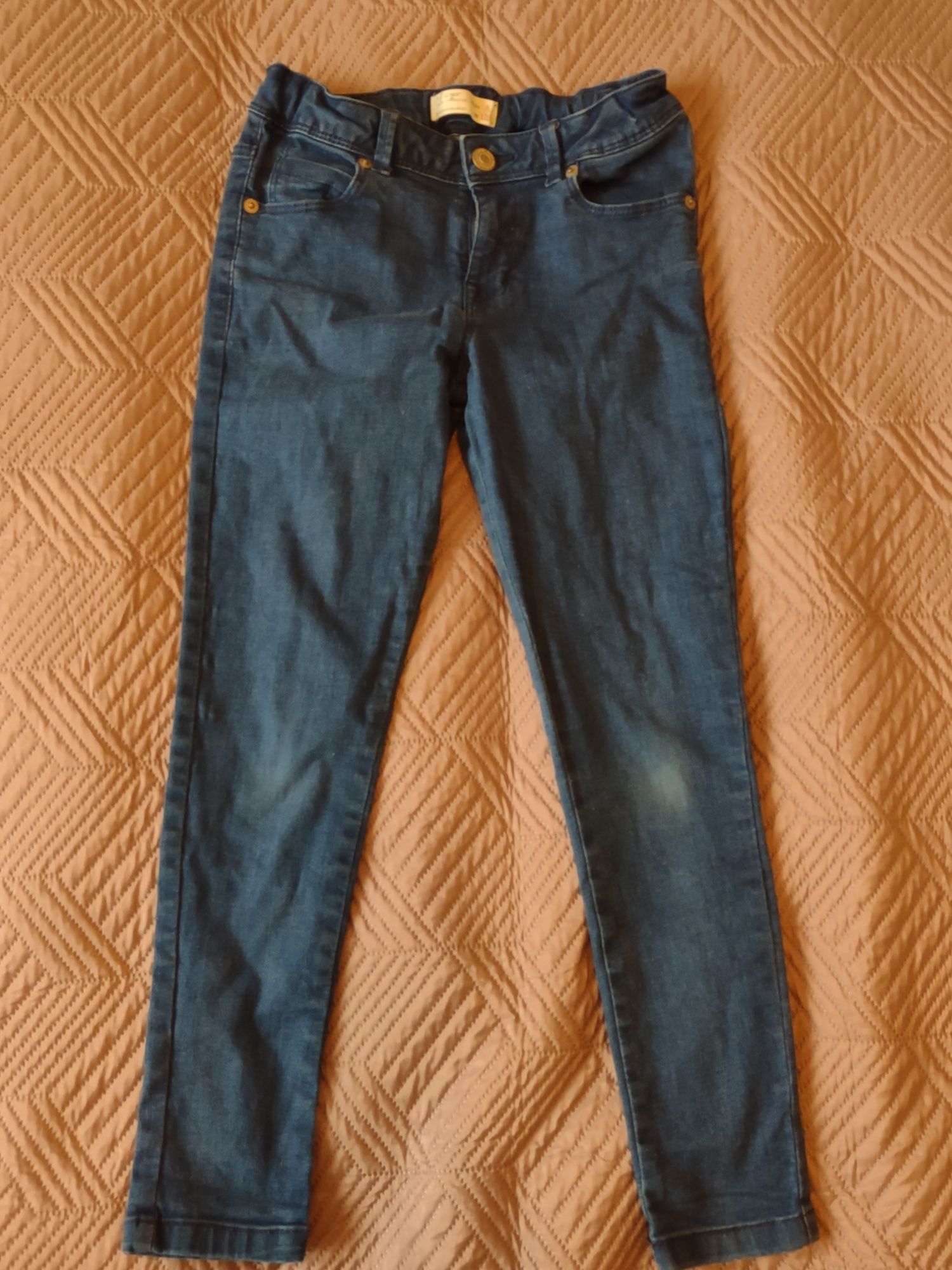 Niebieskie, elastyczne jeansy Zara 128