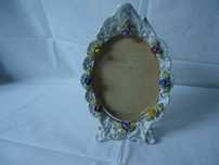 Moldura com miosótis em oval