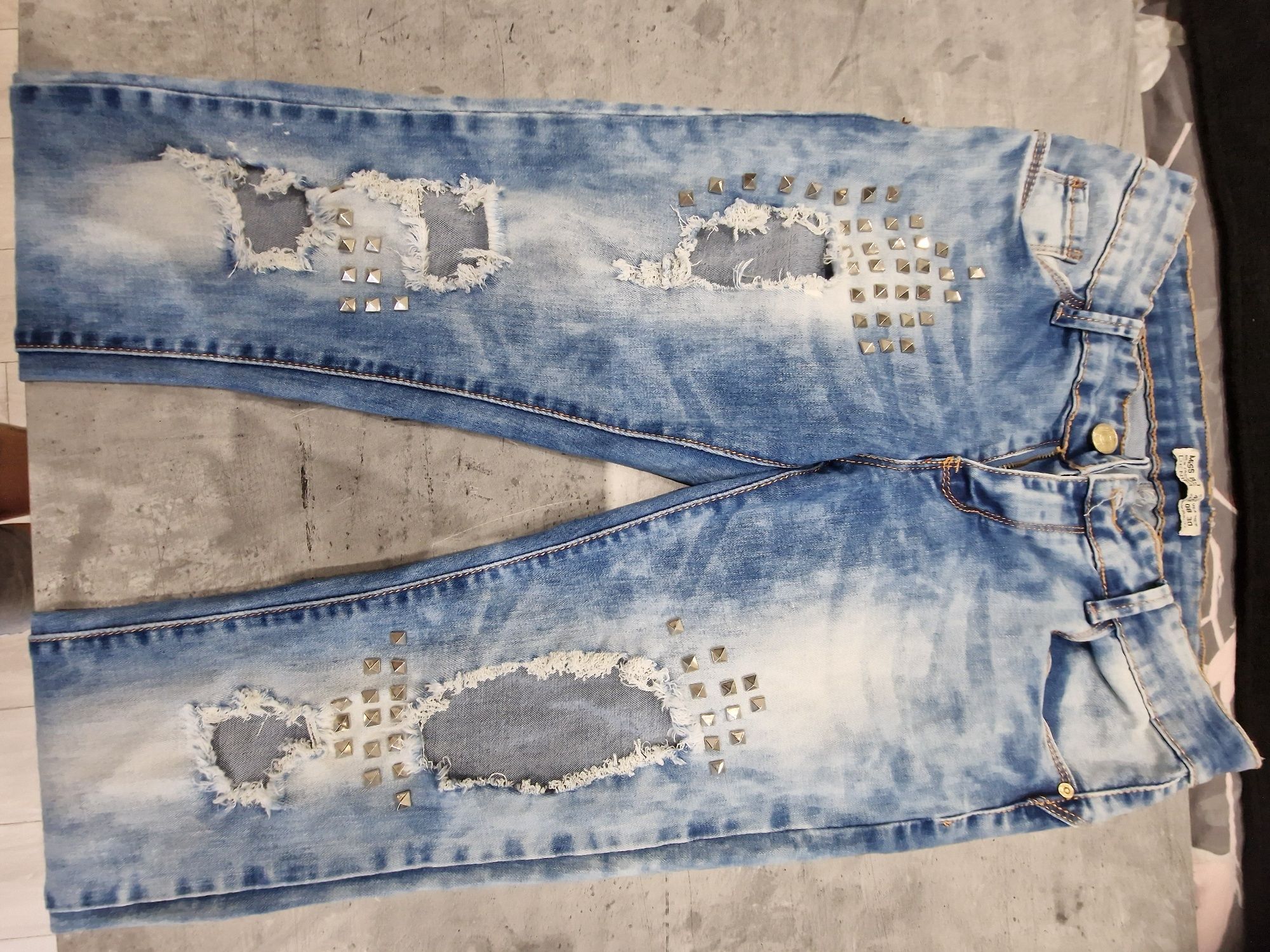 Spodnie jeansy L