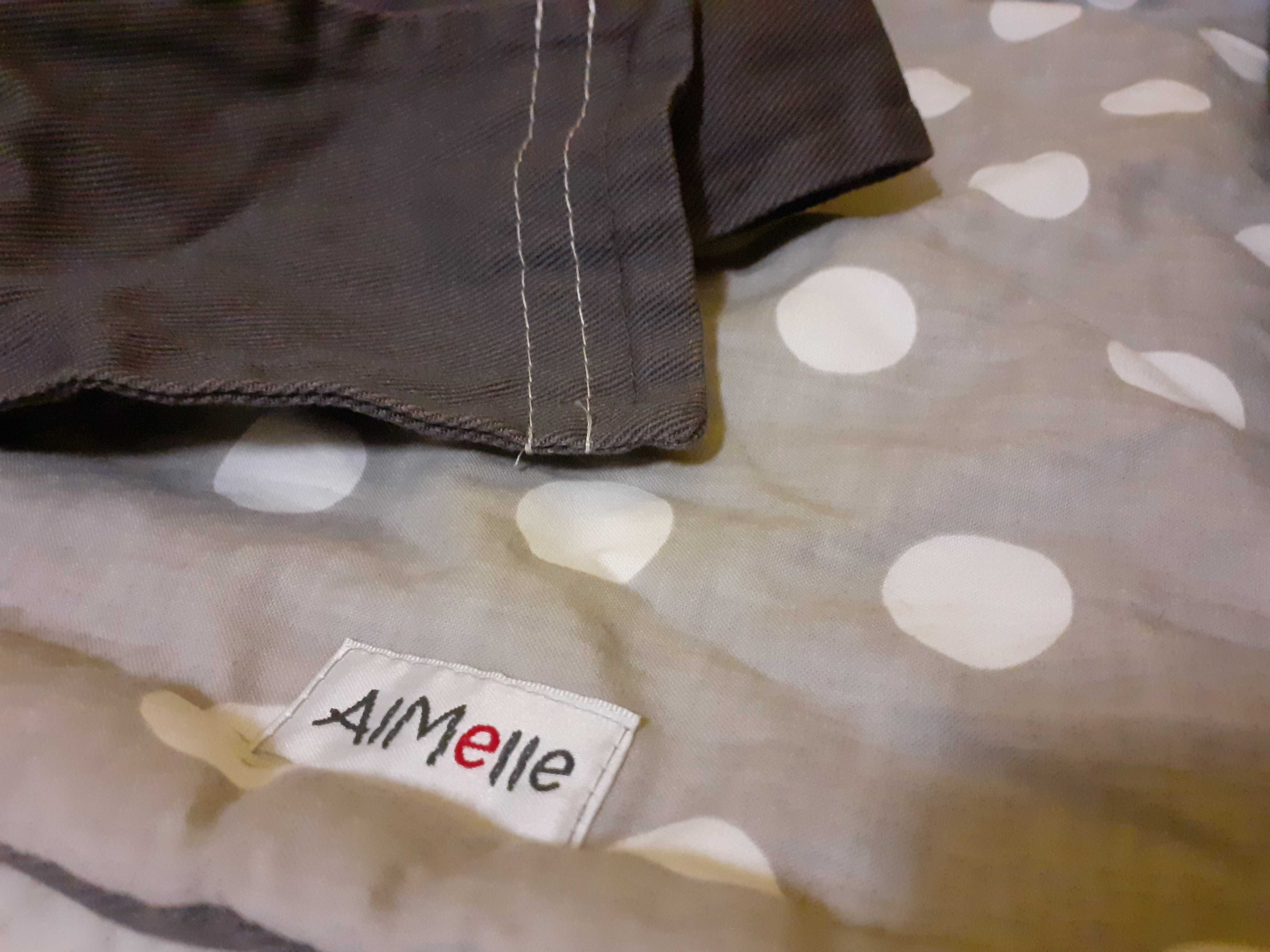 Nosidełko wiązane Almelle 100% ok