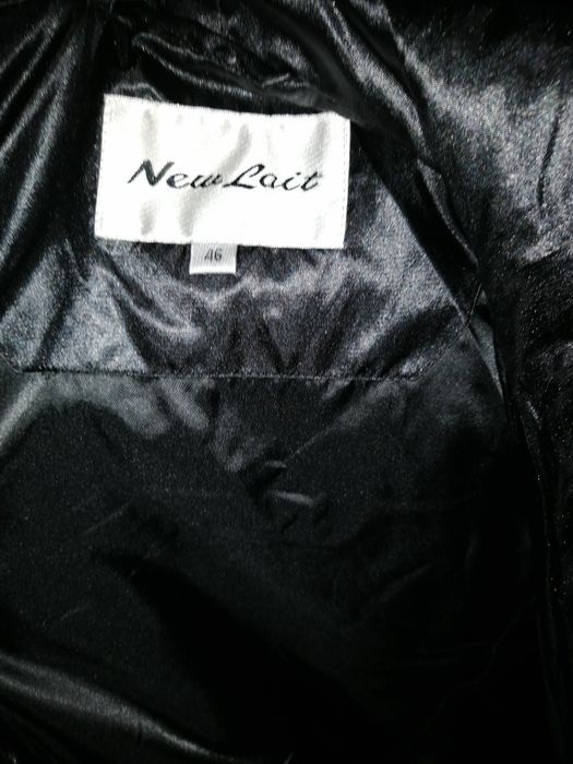 Зимове тепле пальто оздоблене хутром