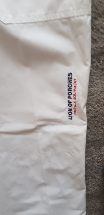 Calças lion of porches