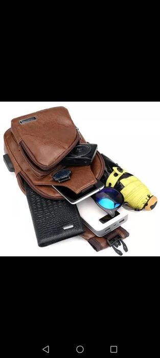 Сумка (барсетка) чоловіча темно-коричневого кольору.