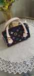 Mała torebka Louis Vuitton
