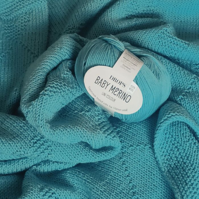 Ręcznie robiony kocyk dla niemowlaka z wełny merino